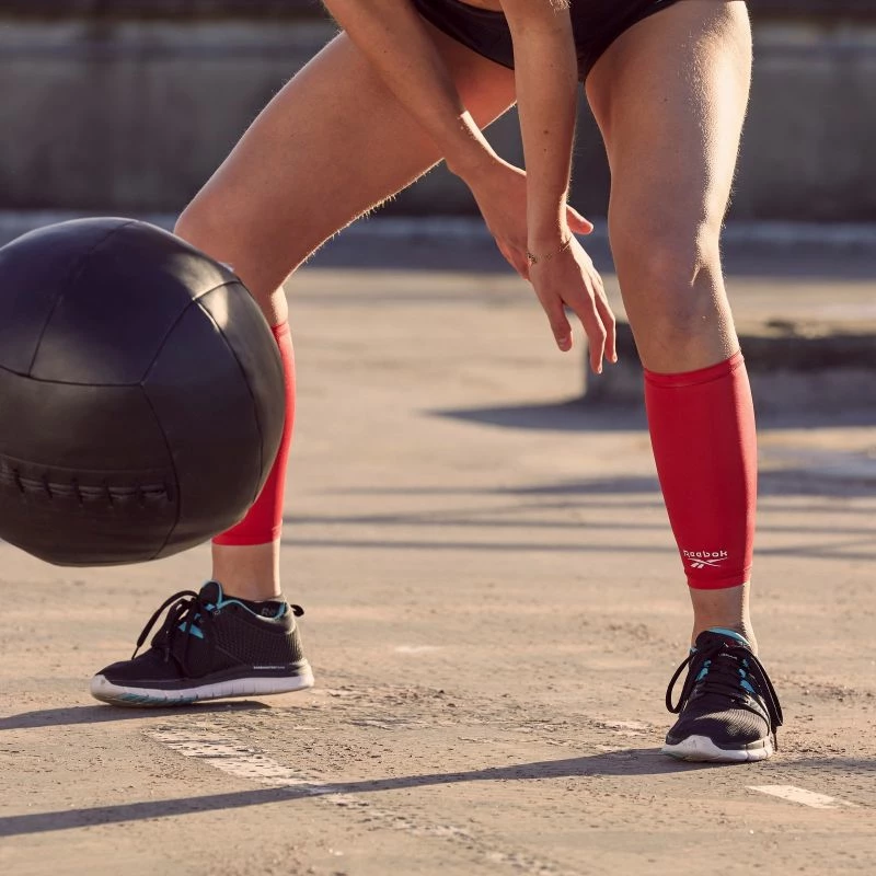 Kompresijske tekaške manšete Reebok, rdeče Kompresijske tekaške manšete Reebok, rdeče