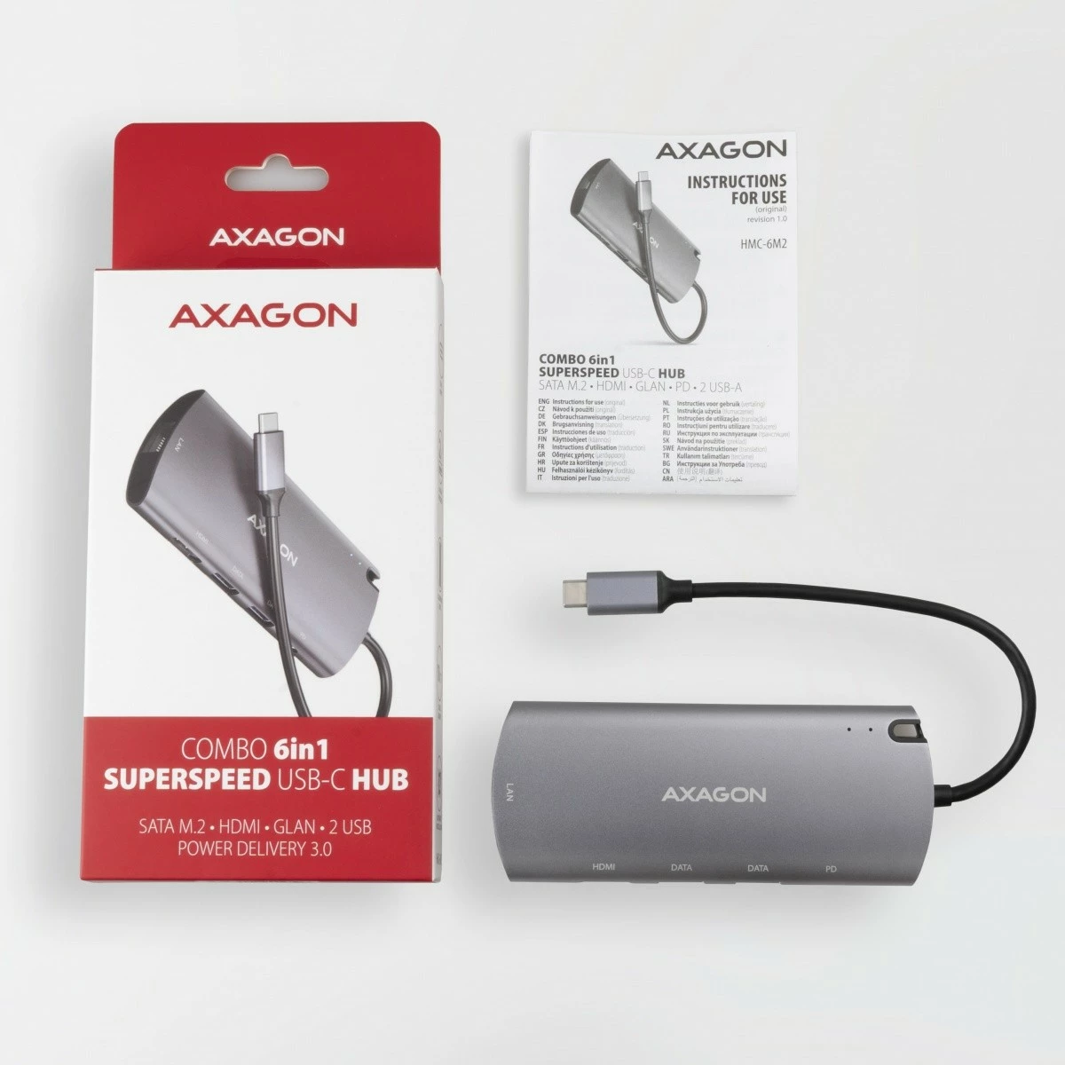 Multifunkcionalen hub 6‑v‑1 AXAGON HMC-6M2, USB-C 3.2 Gen 1, režo M.2 SATA, HDMI, GLAN, 2x USB-A, PD 100W, siva