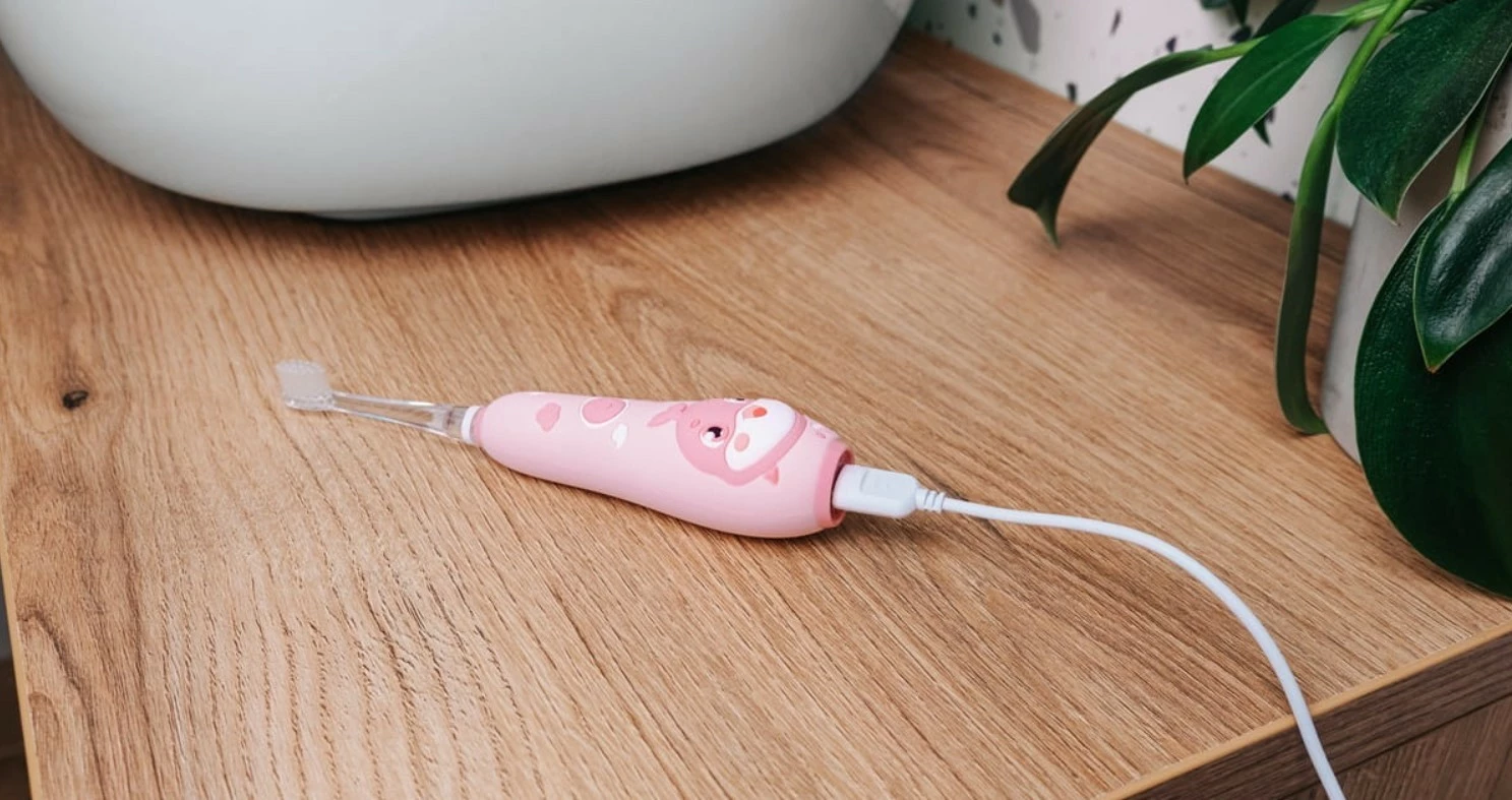 Sonična otroška električna zobna ščetka KIDO SMILE ZK3010 Concept Baby, 1–5 let, roza, komplet s 4 glavami Sonična otroška električna zobna ščetka KIDO SMILE ZK3010 Concept Baby, 1–5 let, roza, komplet s 4 glavami