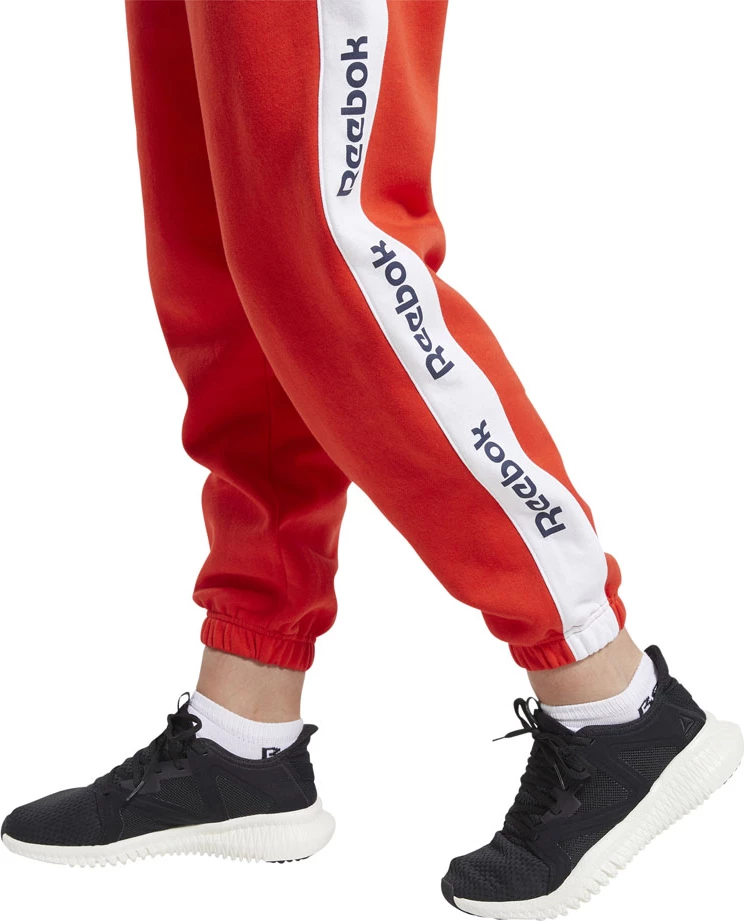 Trenirka za ženske Reebok, rdeča Trenirka za ženske Reebok, rdeča