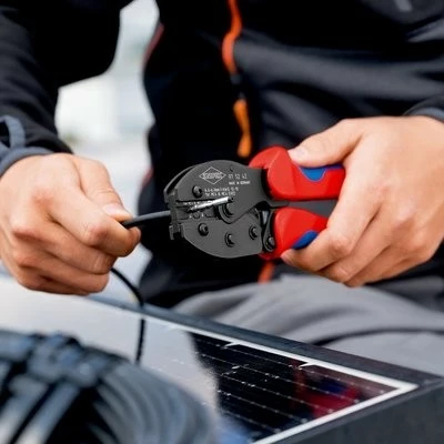 Klešče za stiskanje konektorjev MC4/EVO2 Knipex PreciForce, rdeče/modre ročaje